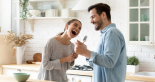 couple in kitchen, talking