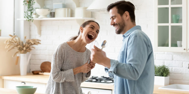 couple in kitchen, talking