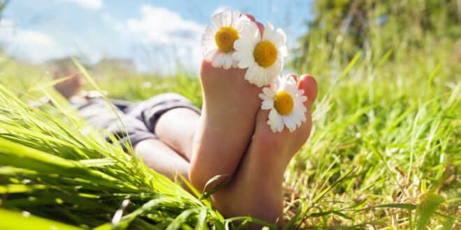 feet with daisies