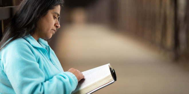 lady reading Bible