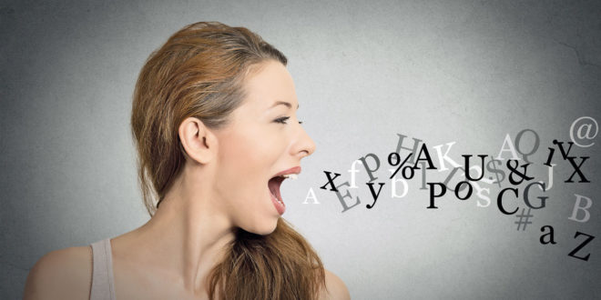 woman spewing letters from mouth