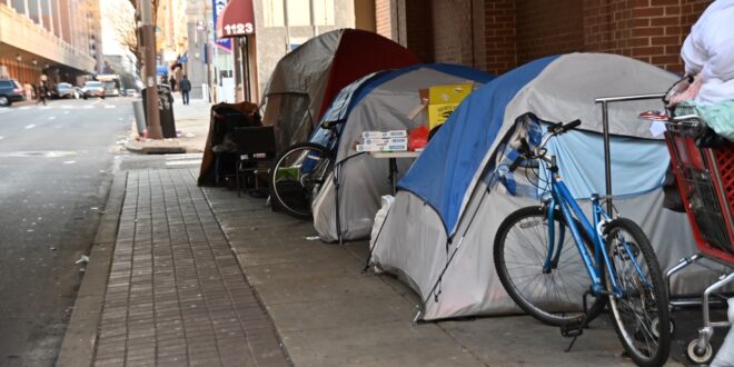 homeless people living in tents