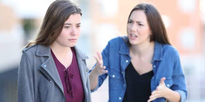one young woman trying to convince another young woman